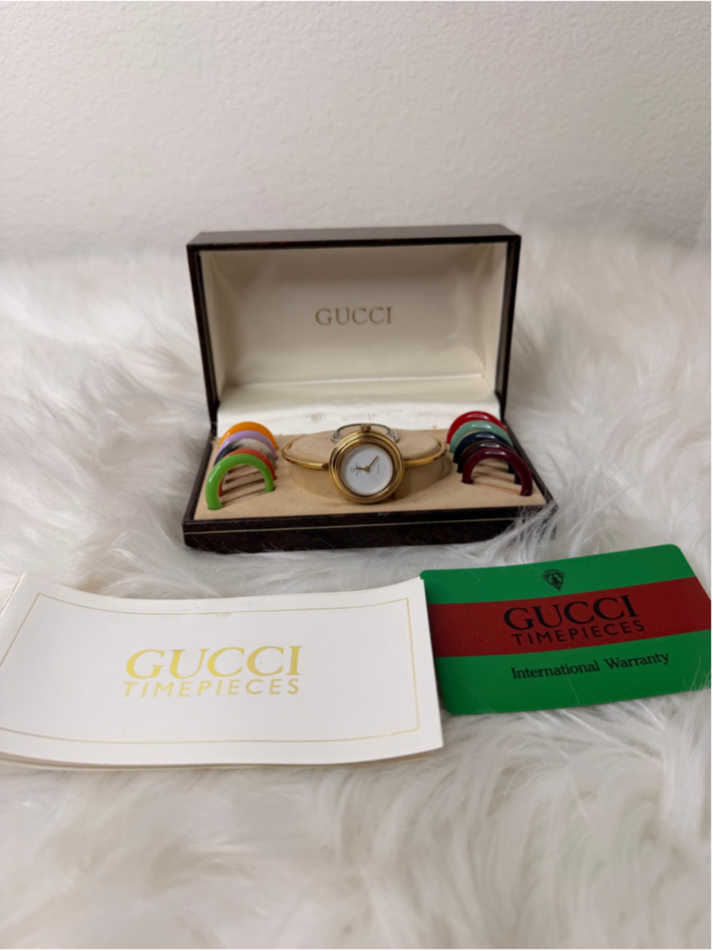 Vintage Gucci Interchangeable Bezel Bangle Watch, w/ 12 bezels, box & paperwork